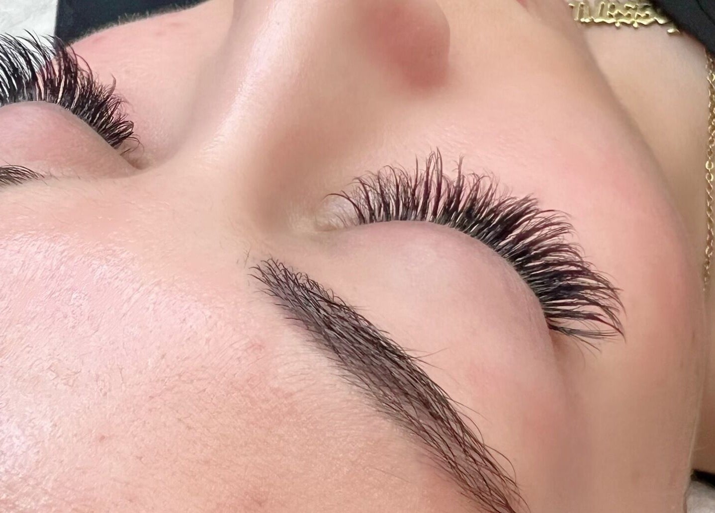Close-up of eyelash extensions at Merum Face Bar in Allen, Texas, US, showcasing volume and precision.