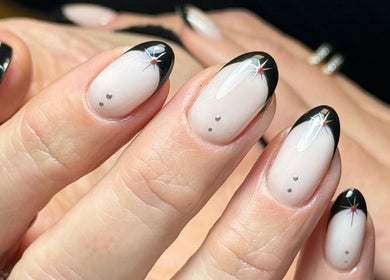 Chic black-tipped nails at Just Gelled Nails & Education, Halesowen, England, GB enhance elegance.