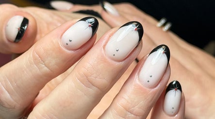 Chic black-tipped nails at Just Gelled Nails & Education, Halesowen, England, GB enhance elegance.