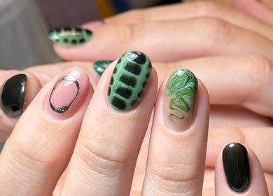 Stylish green and black nail art at Just Gelled Nails & Education, Halesowen, England, GB.