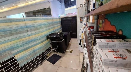 Stylish salon sink area at Rich & Ridge Hair Gallery, Singapore, Singapore, SG, showcasing hair products.