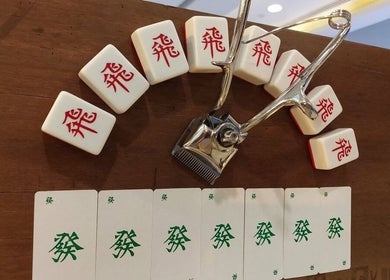 Stylish mahjong tiles at Rich & Ridge Hair Gallery, Singapore, SG symbolize elegance.