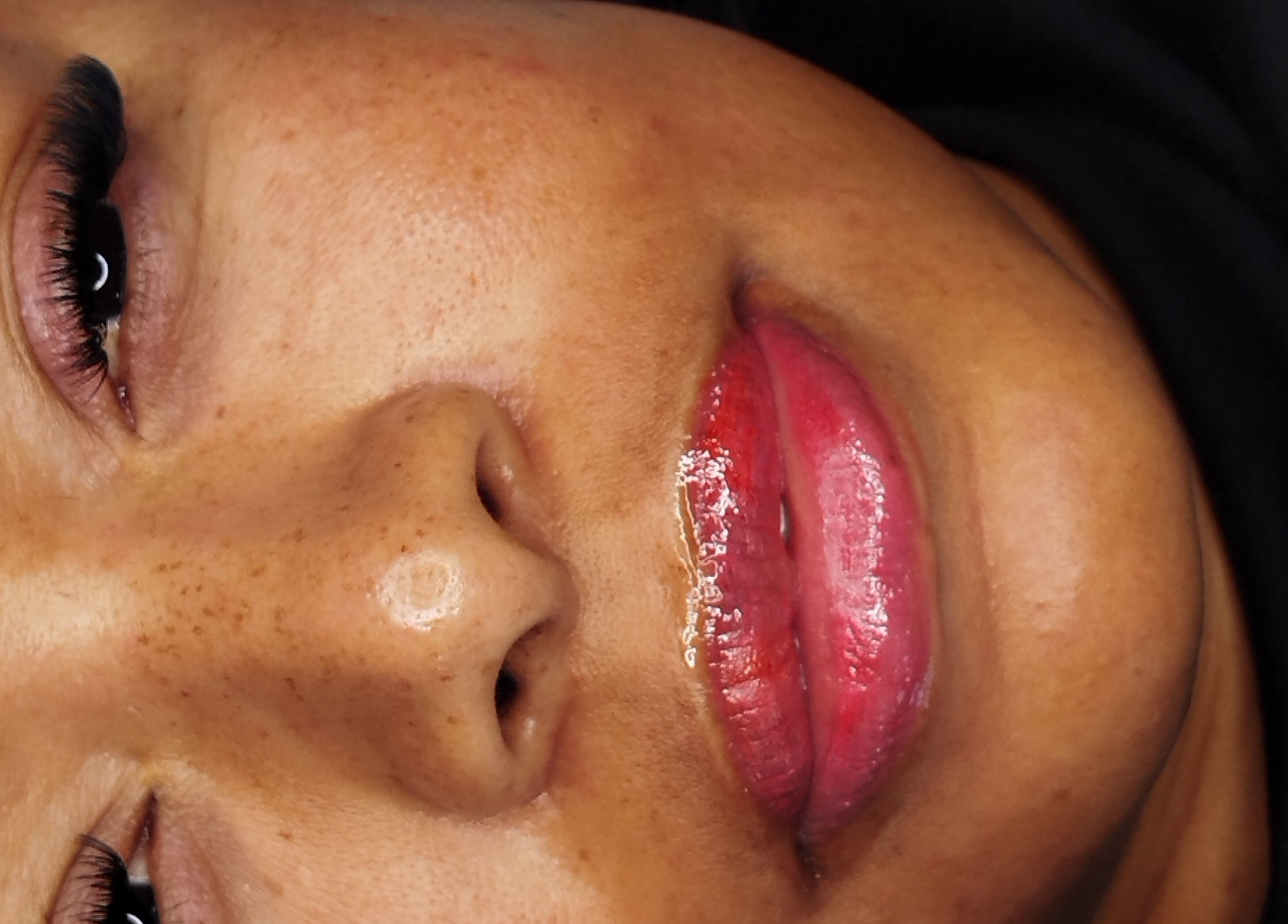 Close-up of enhanced eyelashes and lips at ILashed, Cape Town, South Africa, ZA.