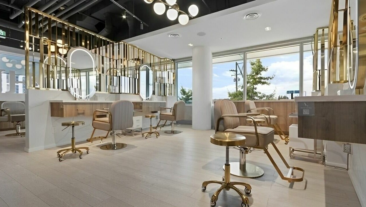 Chic interior of Mophead Bridgeport salon in Richmond, British Columbia, CA, featuring modern styling stations.