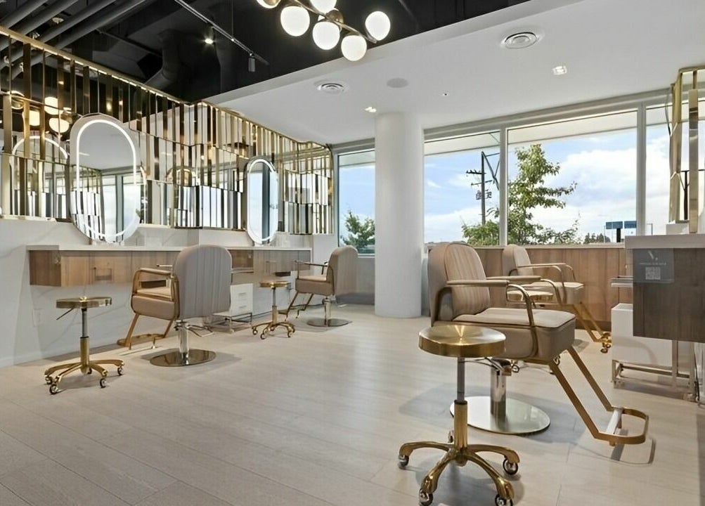 Chic interior of Mophead Bridgeport salon in Richmond, British Columbia, CA, featuring modern styling stations.