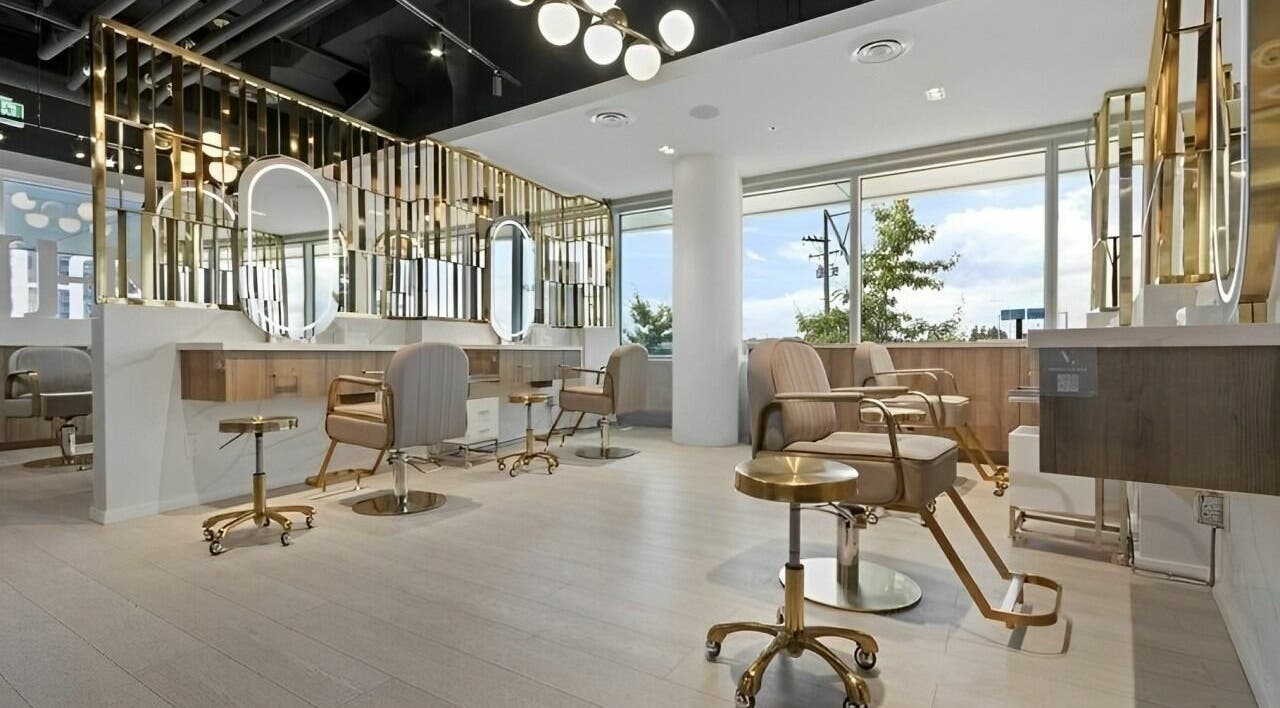 Chic interior of Mophead Bridgeport salon in Richmond, British Columbia, CA, featuring modern styling stations.