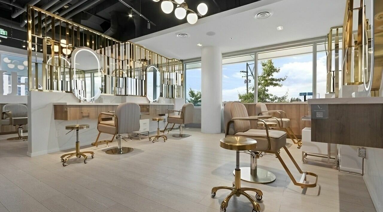 Chic interior of Mophead Bridgeport salon in Richmond, British Columbia, CA, featuring modern styling stations.