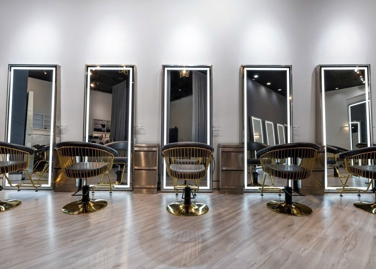 Modern salon chairs and mirrors at Mophead Aberdeen, Richmond, British Columbia, CA.