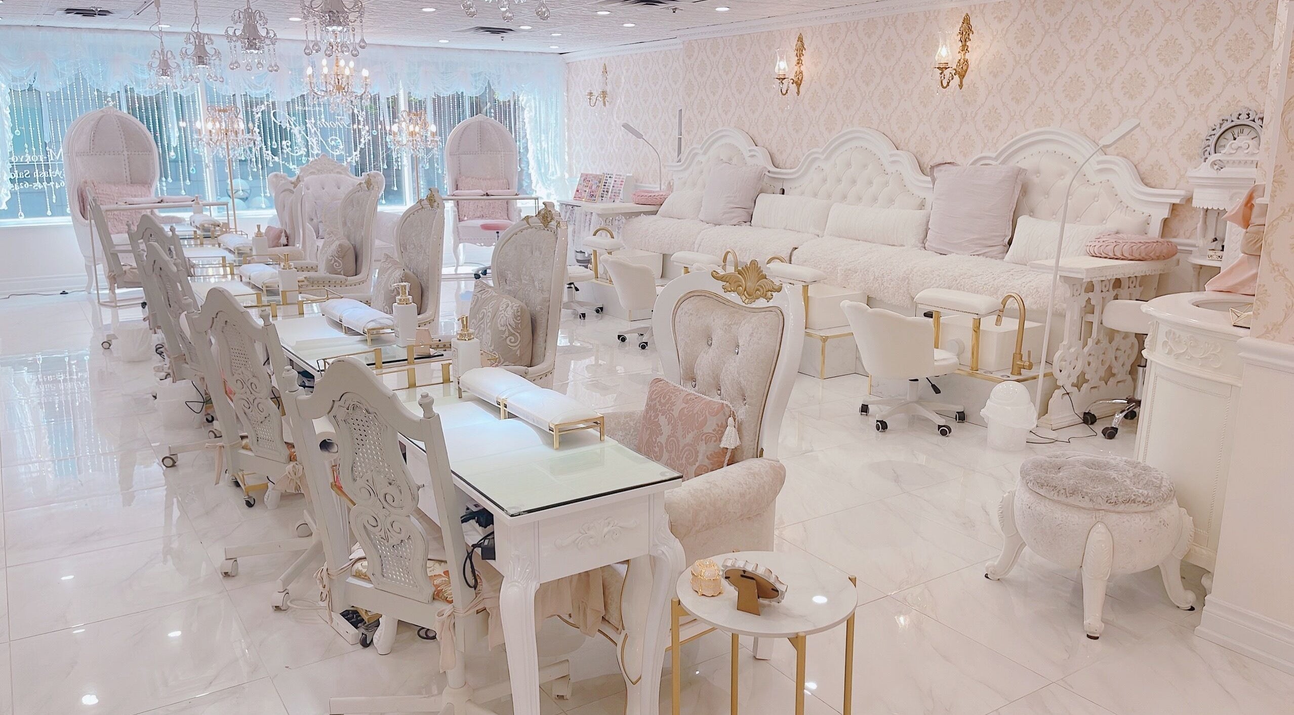 Luxurious interior of From M -Tokyo- in Toronto, Ontario, CA featuring plush chairs and elegant decor.