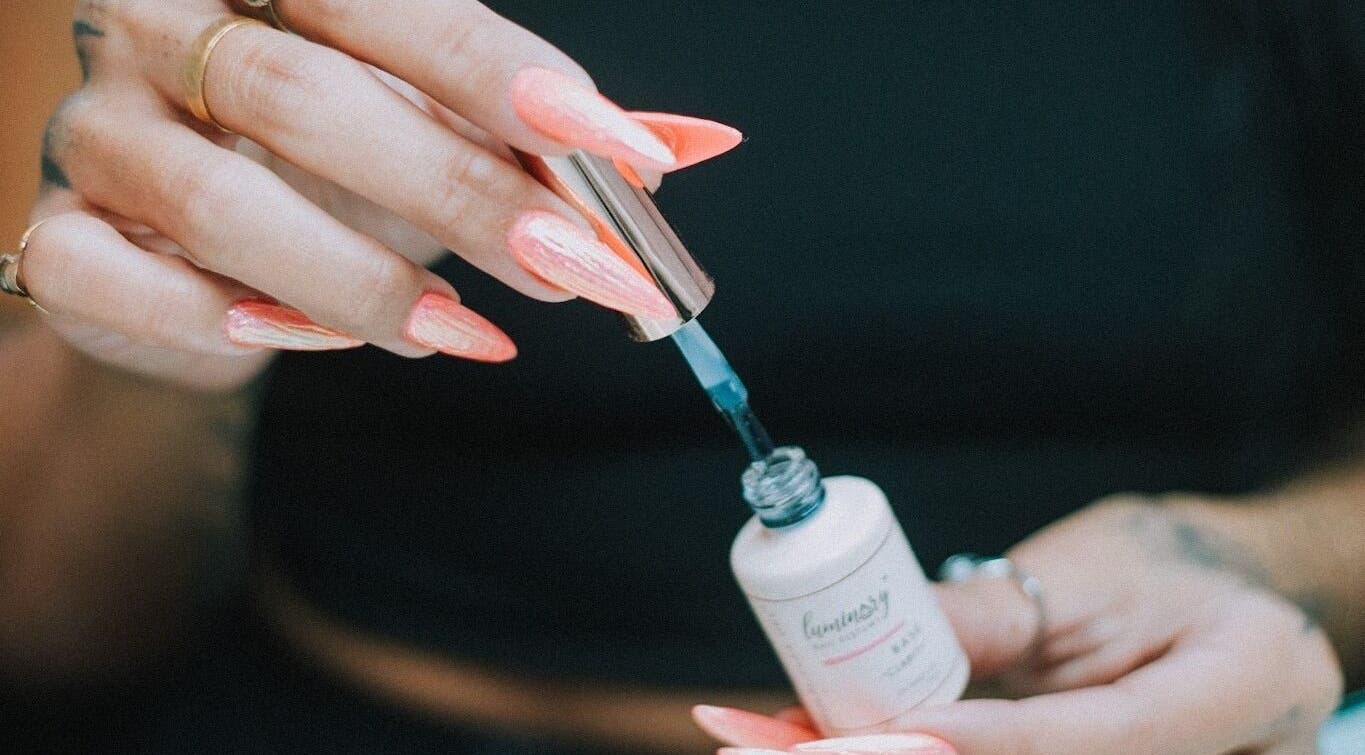 Close-up of vibrant nail polish application at So Nailz, Draper, Utah, US.