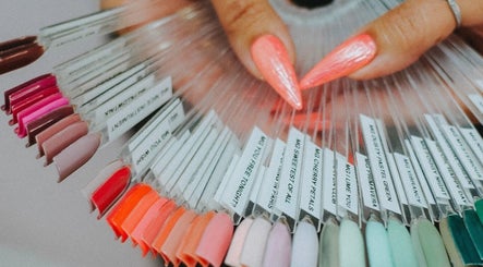 Colorful nail palette at So Nailz, Draper, Utah, US showcasing diverse polish options.