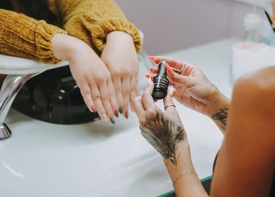 Professional nail polish application at So Nailz in Draper, Utah, US.