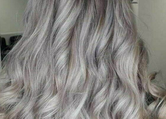 Gorgeous silver hair styled in waves at Mirrors of Airdrie, Airdrie, Scotland, GB.