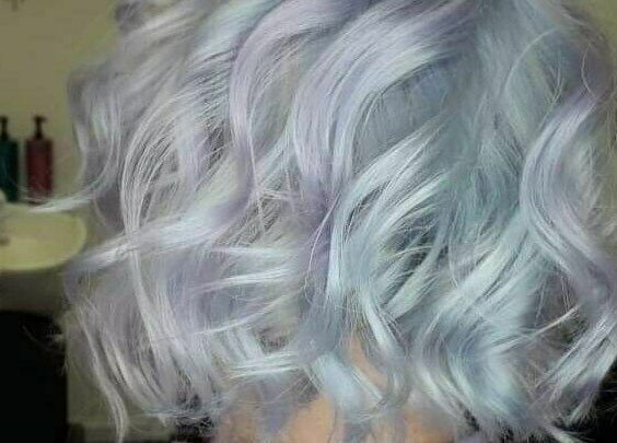 Elegant silver curls hairstyle at Mirrors of Airdrie, Airdrie, Scotland, GB.