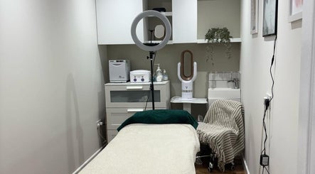 Cozy treatment room at The Hair and Beauty Lounge, Crawley, England, GB, featuring modern spa equipment.