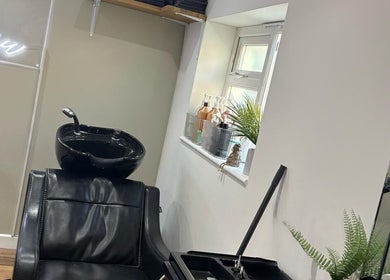 Luxurious wash station at The Hair and Beauty Lounge, Crawley, England, GB, featuring sleek design and comfort.