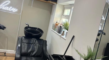 Luxurious wash station at The Hair and Beauty Lounge, Crawley, England, GB, featuring sleek design and comfort.