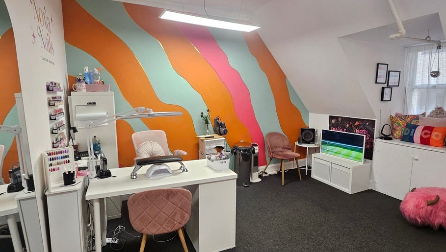 Nova Nails salon in Glasgow, Scotland, GB with colorful decor and modern nail stations.