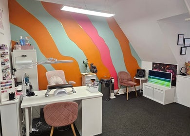 Nova Nails salon in Glasgow, Scotland, GB with colorful decor and modern nail stations.