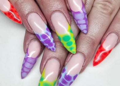 Colorful nail art at Nova Nails, Glasgow, Scotland, GB showcases vibrant artistic designs.
