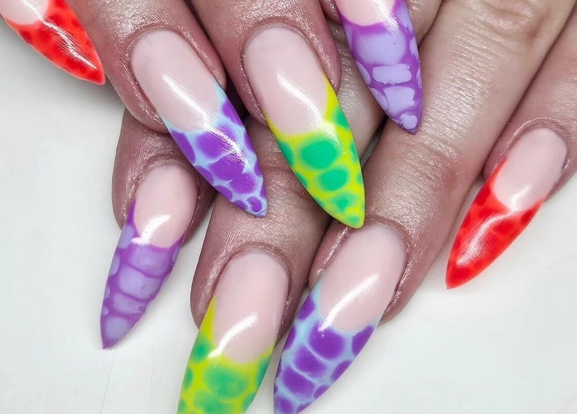 Colorful nail art at Nova Nails, Glasgow, Scotland, GB. Stylish design for vibrant, eye-catching nails.