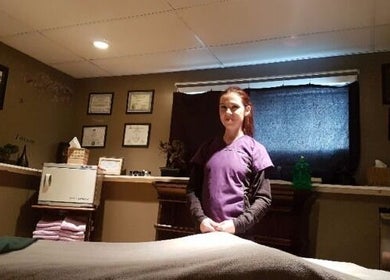 Peaceful massage room at Cori's Healing Hands Massage, Edmonton, Alberta, CA, featuring a tranquil setup.