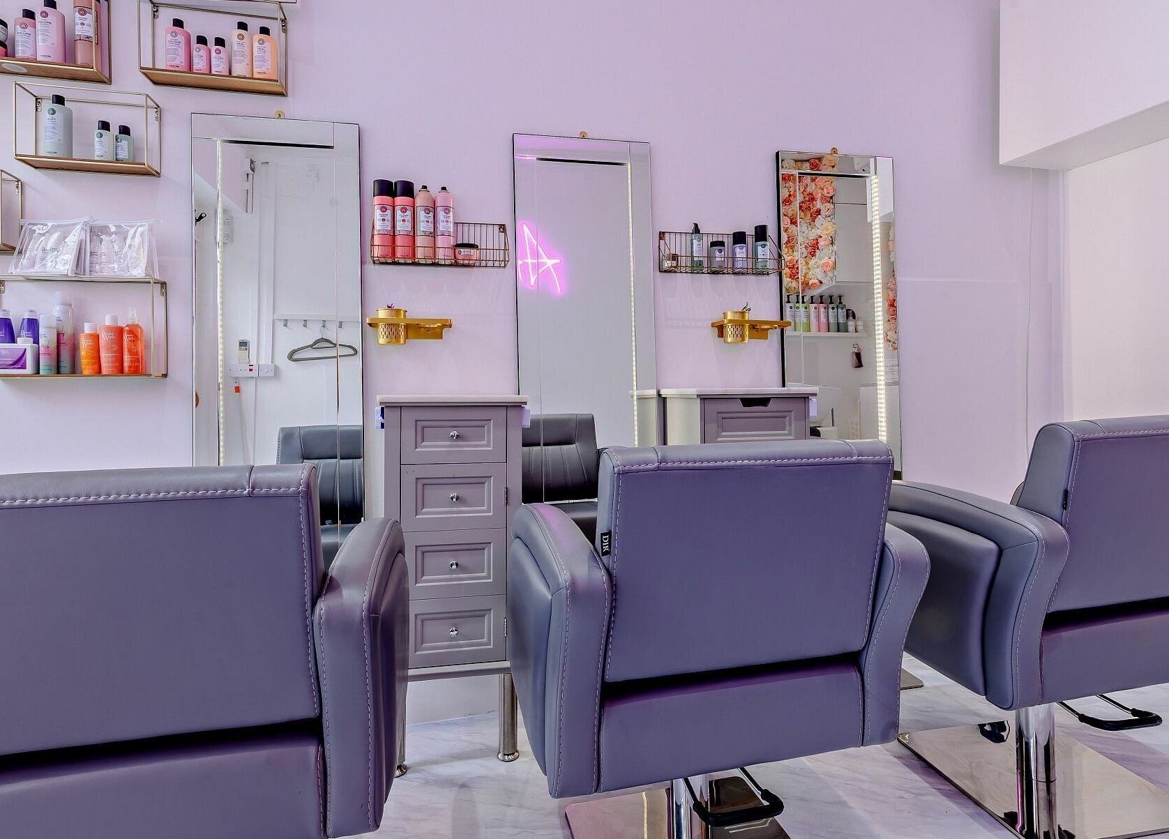 Modern salon chairs and beauty products in AKai, London, England, GB reflect a chic and stylish decor.