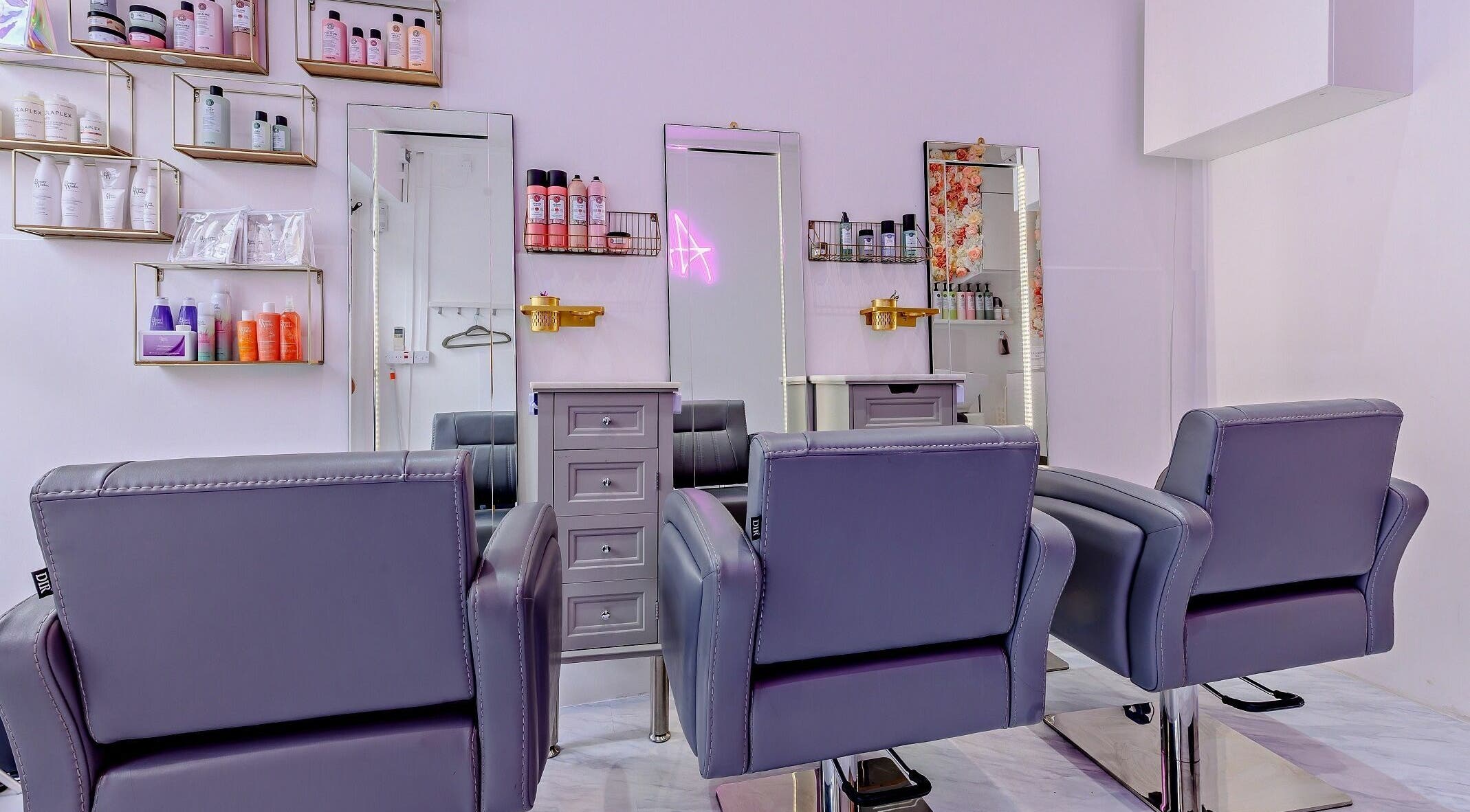Modern salon chairs and beauty products in AKai, London, England, GB reflect a chic and stylish decor.