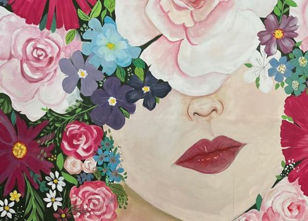 Floral-themed face art at Pop in Beauty Bar, Saint Francis Bay, ZA, blending nature and beauty.