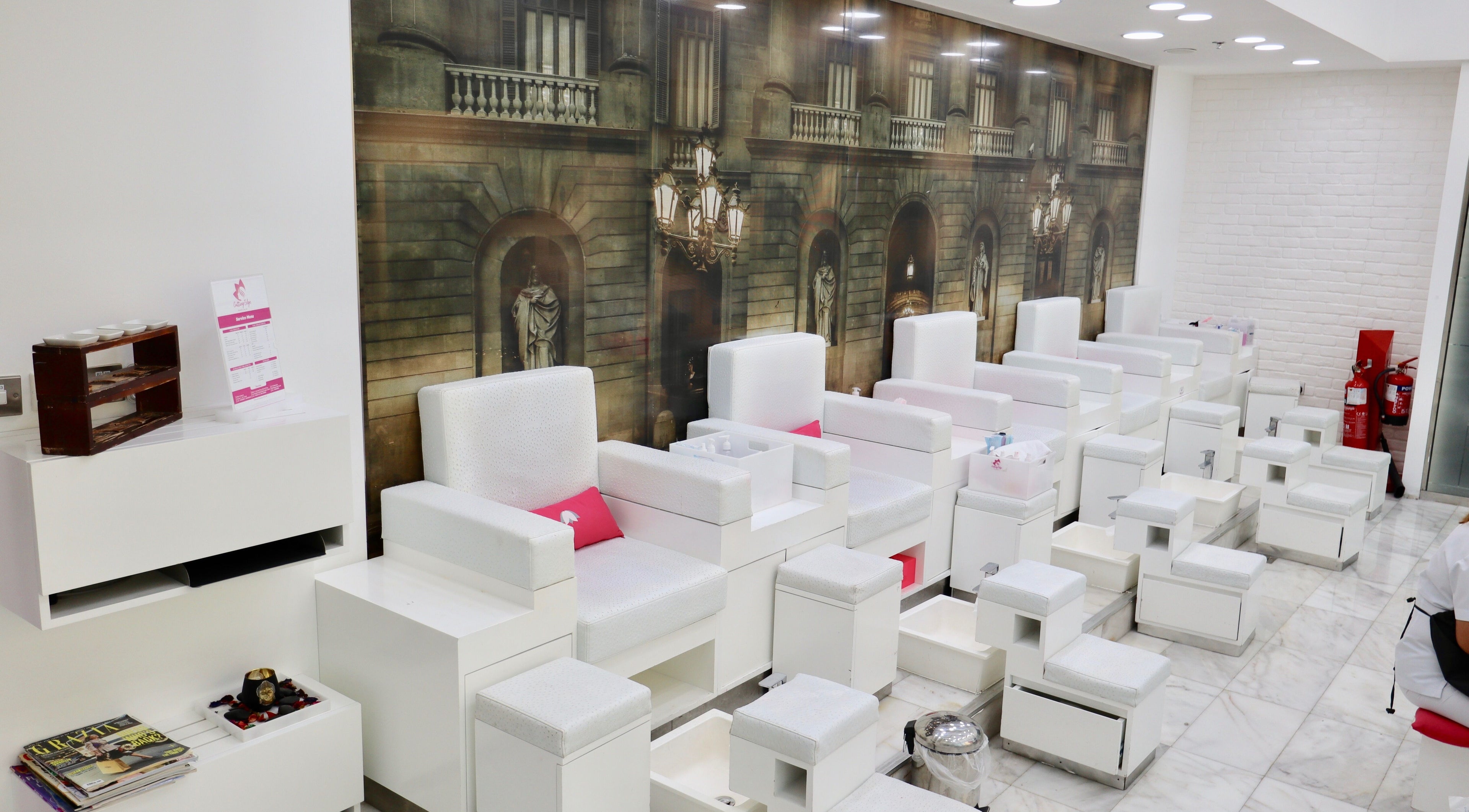 Elegant pedicure lounge at Miss Cutting Edge Ladies Salon - Marina Branch, Dubai, Dubai, AE, featuring luxurious seating.
