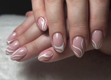 Chic nail art with white swirls at Fix Her Crown, Benoni, Gauteng, ZA.