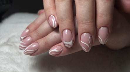 Chic nail art with white swirls at Fix Her Crown, Benoni, Gauteng, ZA.