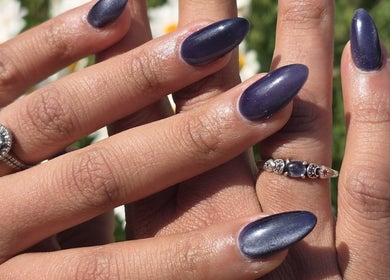 Close-up of elegant manicured nails with rings at Fix Her Crown, Benoni, Gauteng, ZA.
