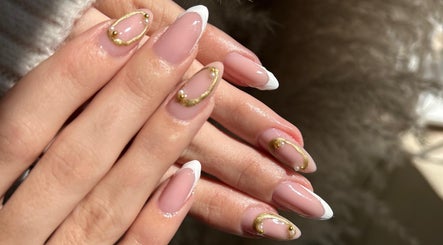 Elegant manicured nails with gold accents at Fix Her Crown, Benoni, Gauteng, ZA.