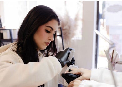 Professional manicure at Fix Her Crown, Benoni, Gauteng, ZA with a specialist filing nails.