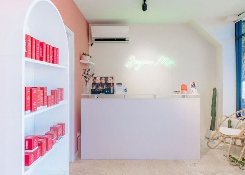 Chic reception area at Sweet Lab Applecross, Applecross, Western Australia, AU with modern decor and neon sign.