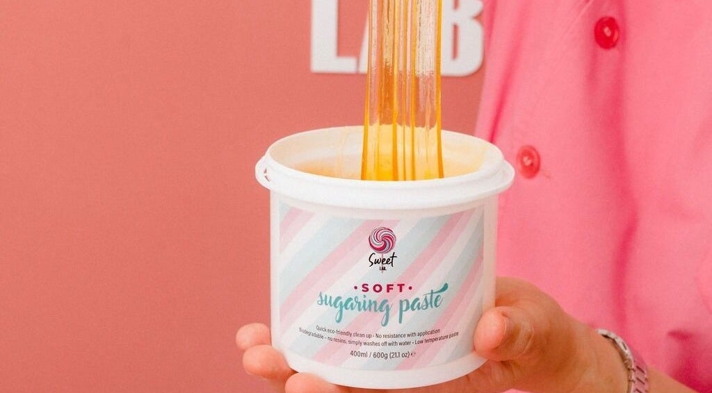 Sugaring paste in hand at Sweet Lab Applecross, Applecross, Western Australia, AU for gentle hair removal.