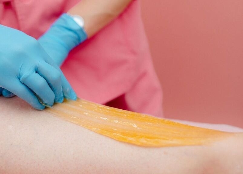 Sugar waxing treatment at Sweet Lab Applecross, Applecross, Western Australia, AU, showing a professional service.