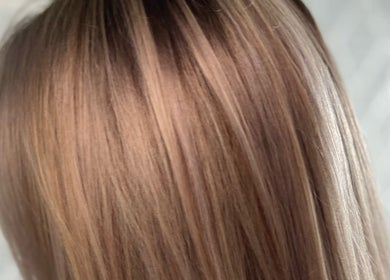 Stylish hair highlights at Liam Dawson Hair in Betherson, England, GB showcasing glossy brunette tones.