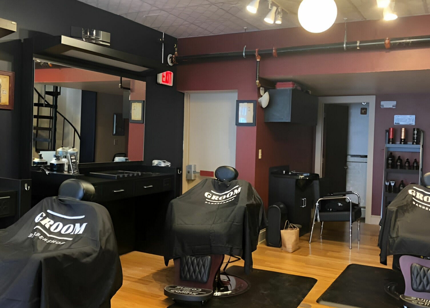 Stylish interior of Groom Barbershop in Easthampton, Massachusetts, US with sleek barber chairs.