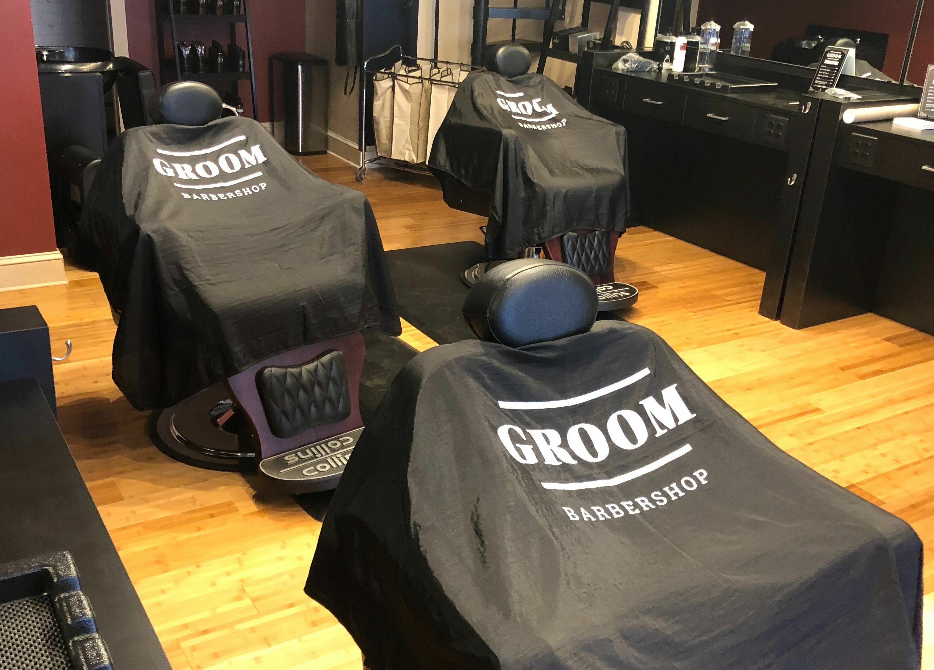 Chairs with Groom Barbershop covers at the stylish venue in Easthampton, Massachusetts, US.