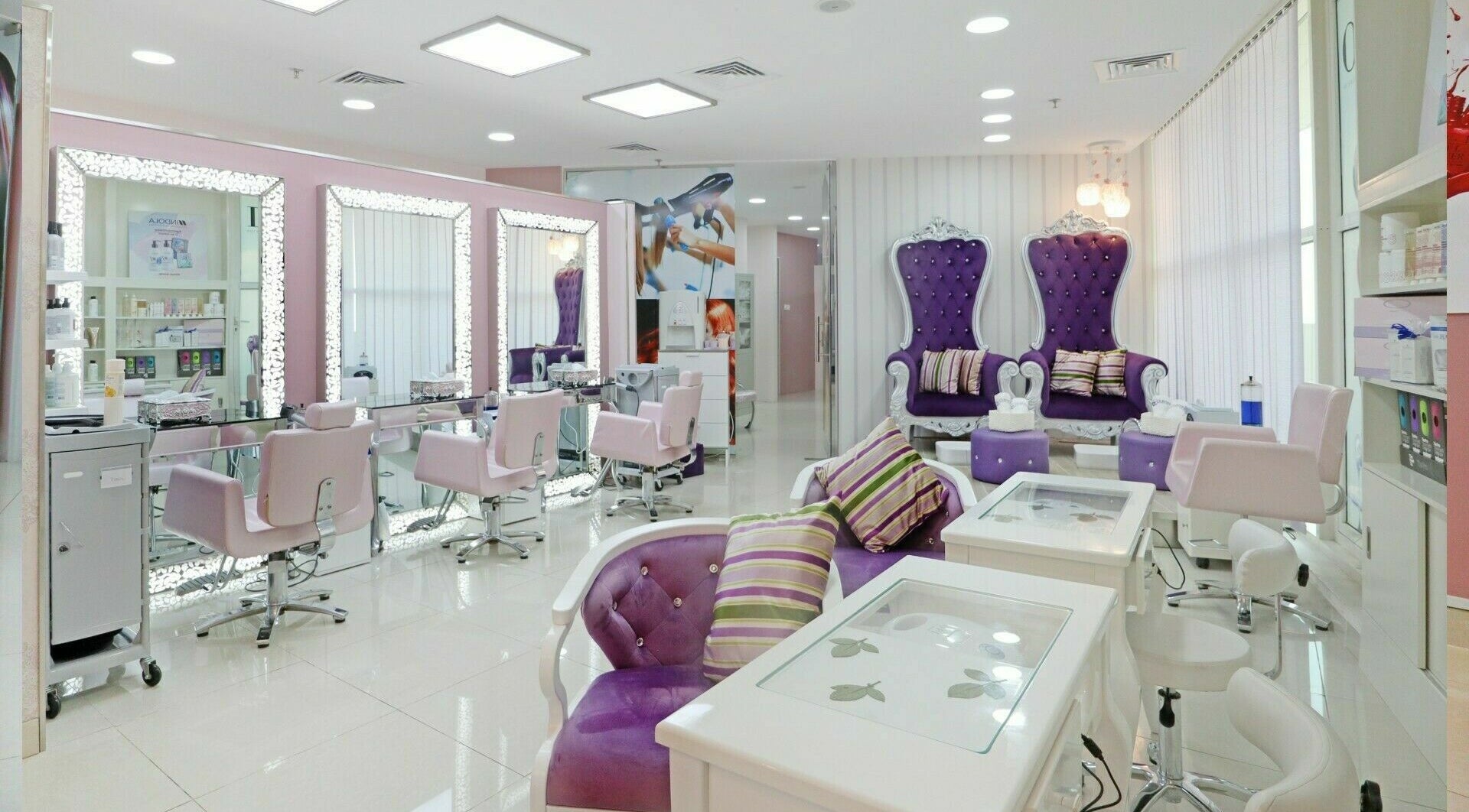 Interior of Cleopatra Beauty Salon & Spa in Dubai, Dubai, AE, featuring elegant styling chairs and plush seating.