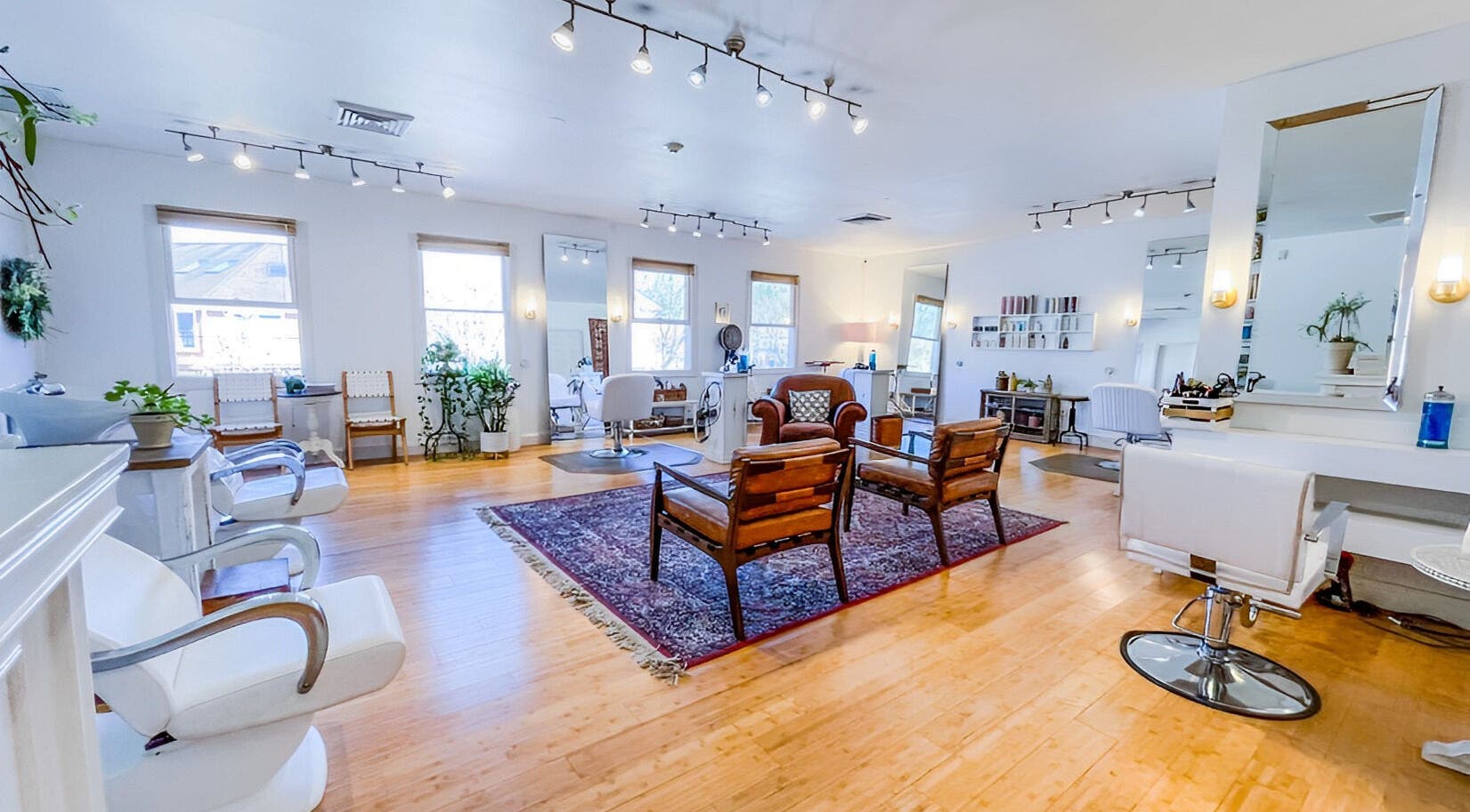 One On One Salon interior showcasing elegant and modern styling areas in Rhinebeck, New York, US