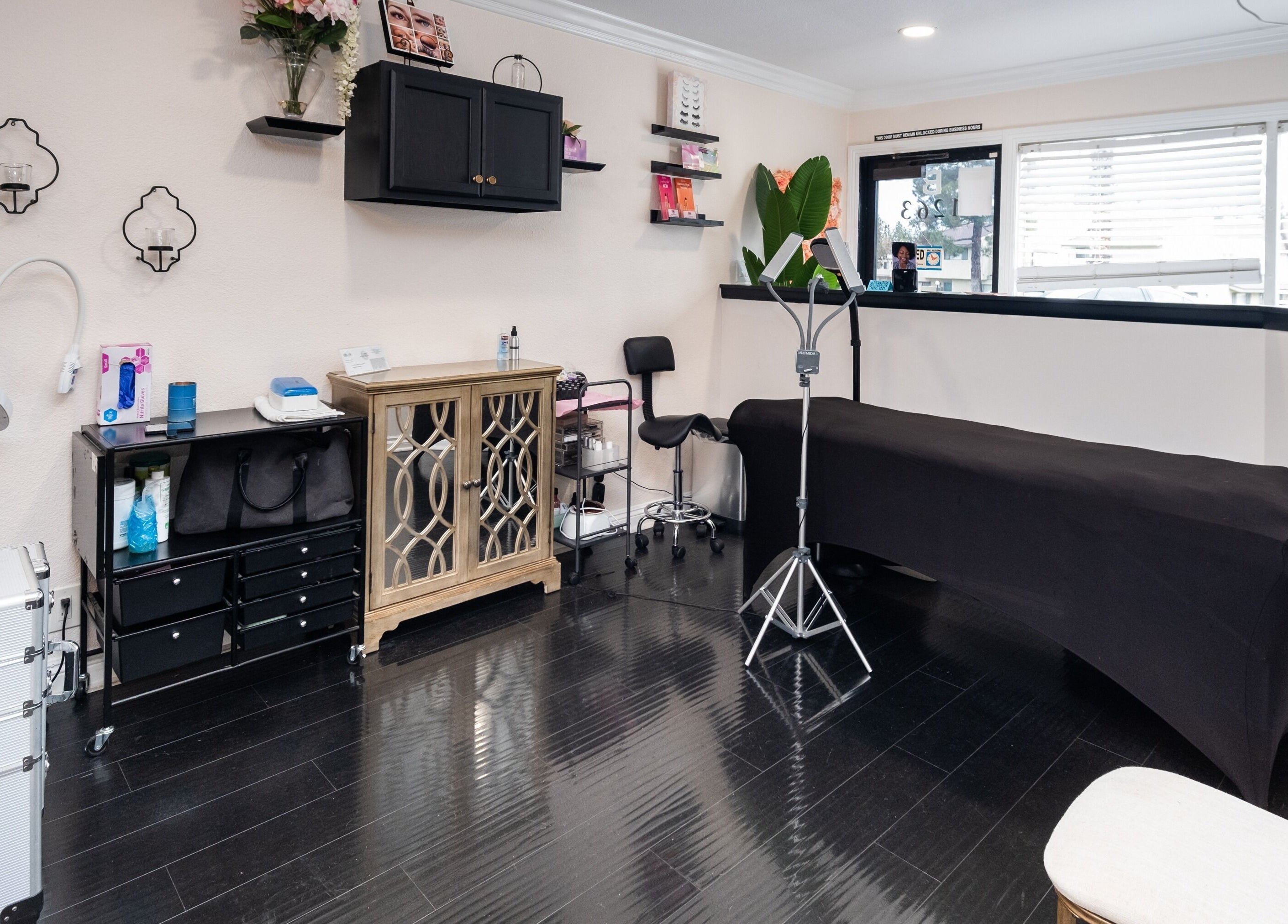 Modern treatment room at Bright Esthetics, Yucaipa, California, US, featuring sleek decor and equipment.