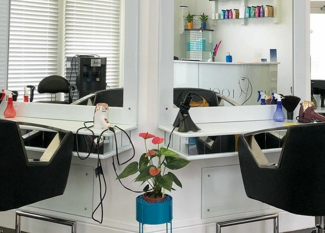 Modern salon station at The Look in Abingdon, England, GB with stylish decor and beauty tools.