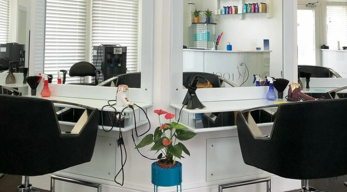 Modern salon station at The Look in Abingdon, England, GB with stylish decor and beauty tools.