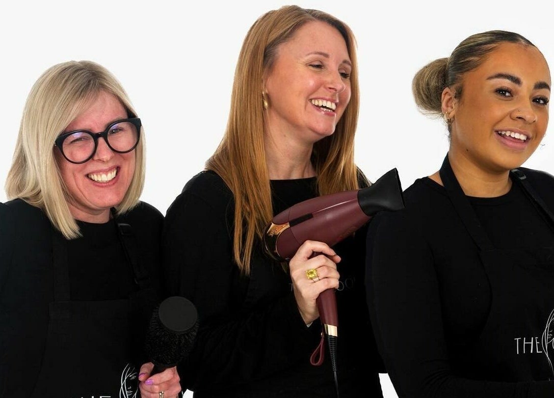 Friendly stylists at The Look, Abingdon, England, GB, showcasing tools and ready to serve clients.