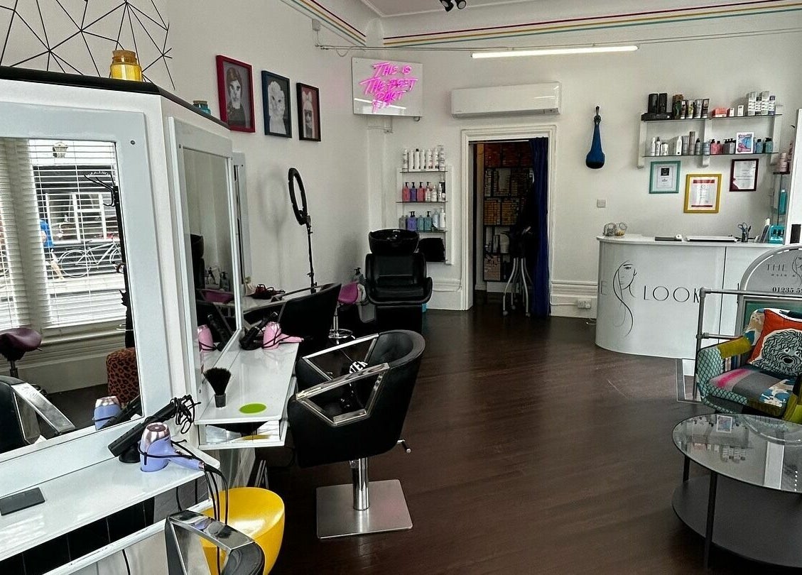 The Look Wheatley Edition salon in Wheatley, England, GB featuring modern styling chairs and vibrant decor.