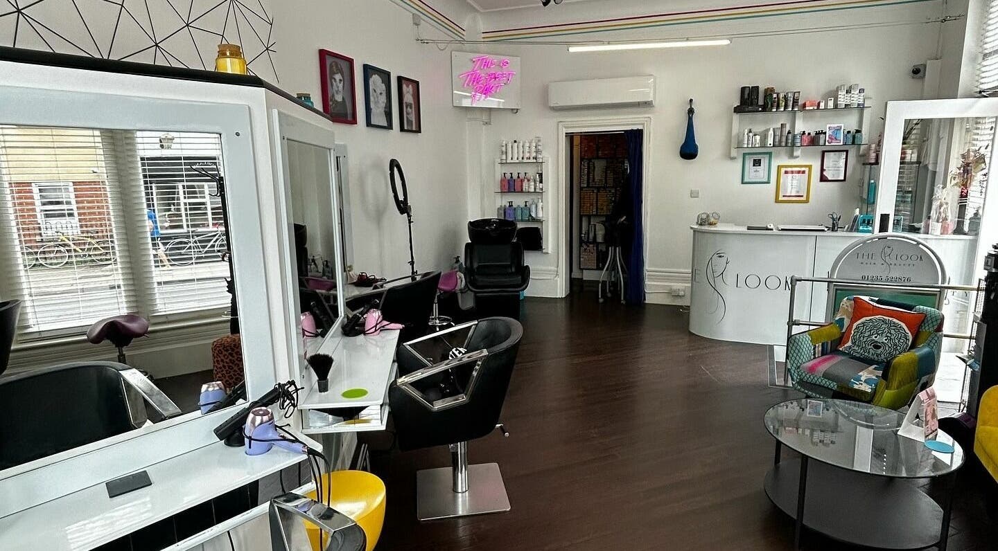 The Look Wheatley Edition salon in Wheatley, England, GB featuring modern styling chairs and vibrant decor.