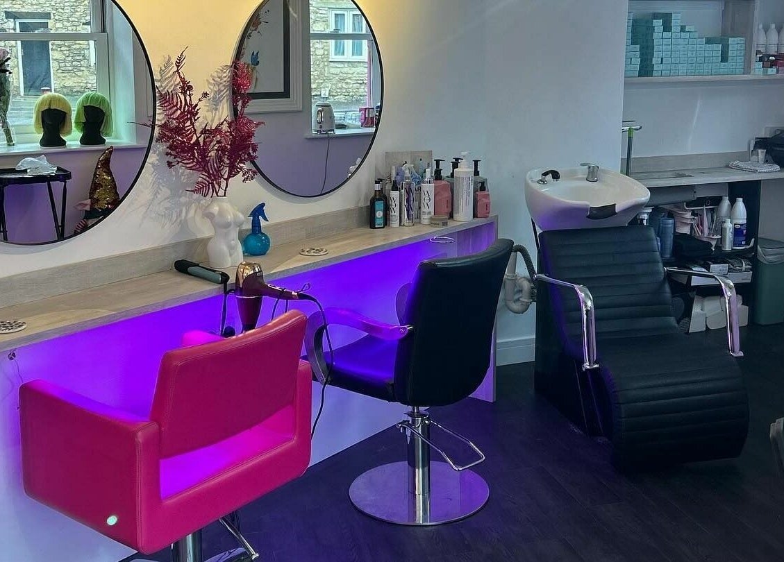 Chic salon chairs and styling stations at The Look Wheatley Edition in Wheatley, England, GB.